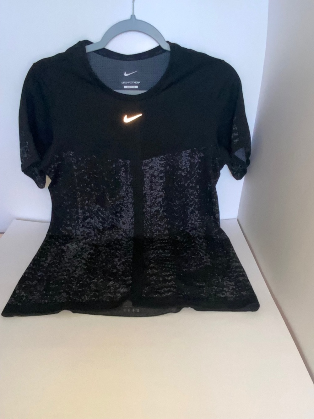 Nike Women’s Dri-FIT ADV short sleeve training top Sizes: Medium and Large